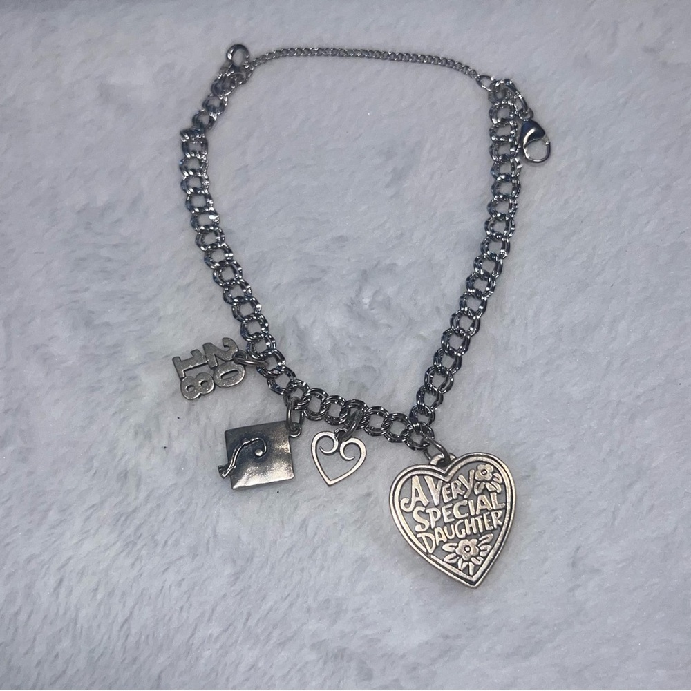 James Avery charm bracelet with 4 charms!